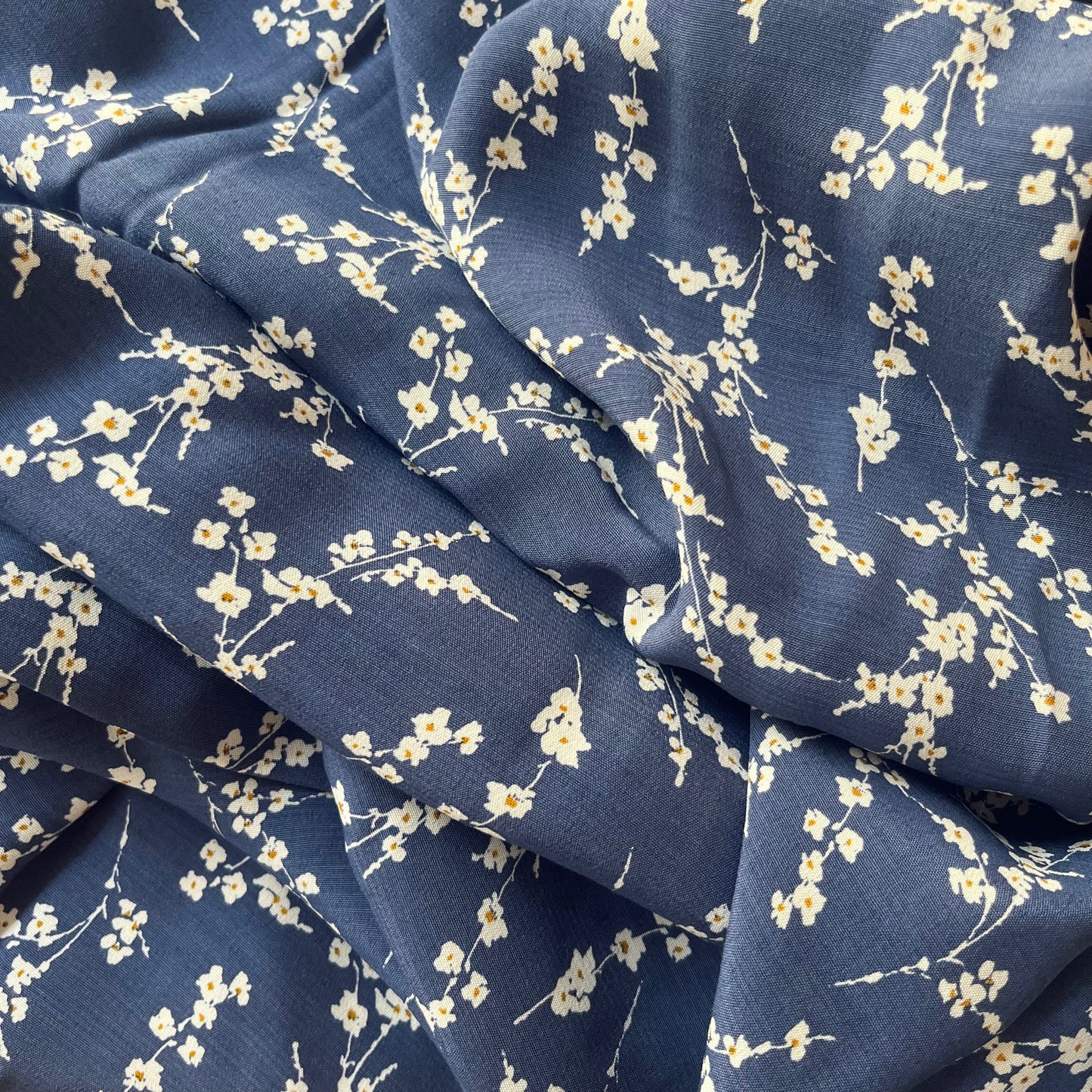 Navy rayon featuring blossoming branches