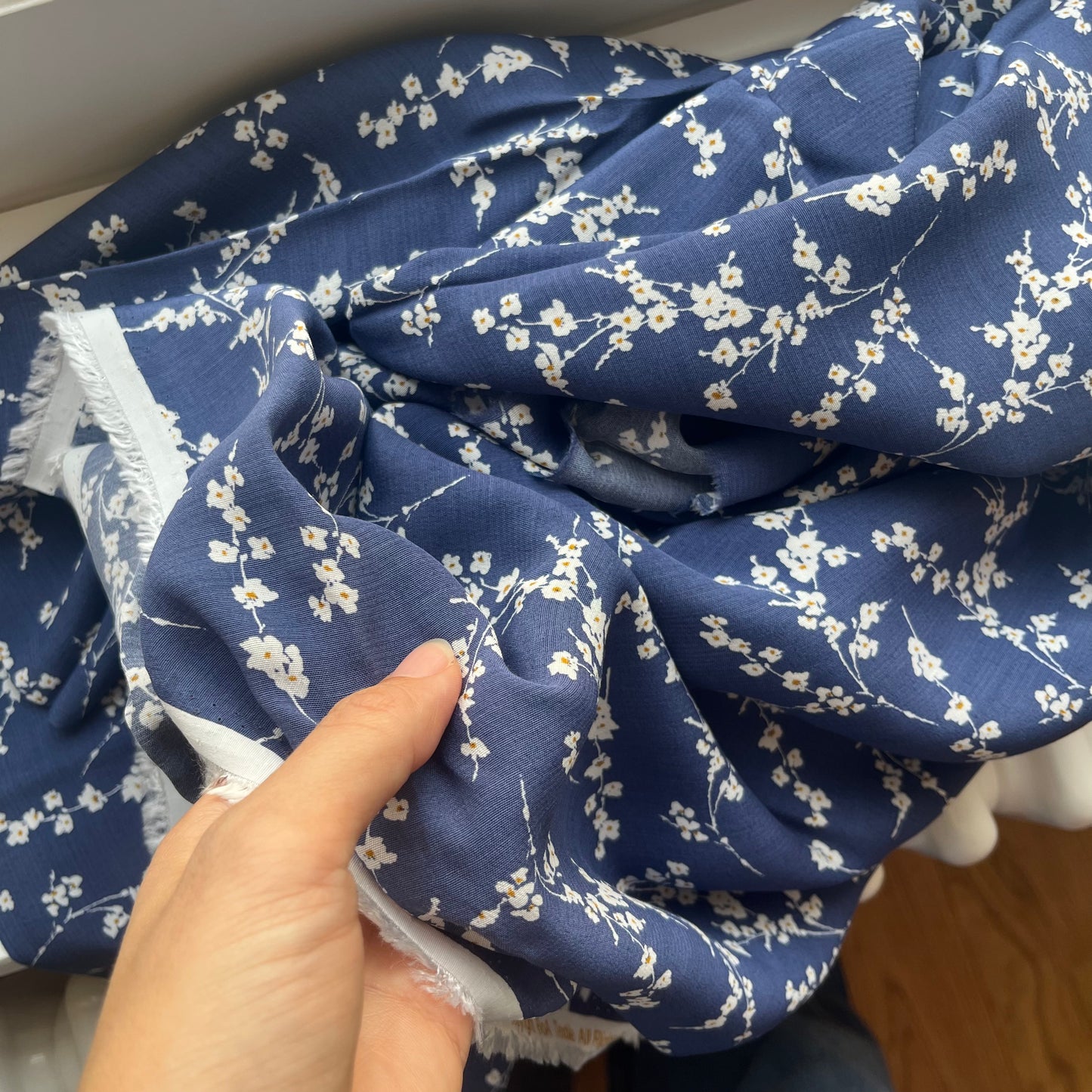 Navy rayon featuring blossoming branches
