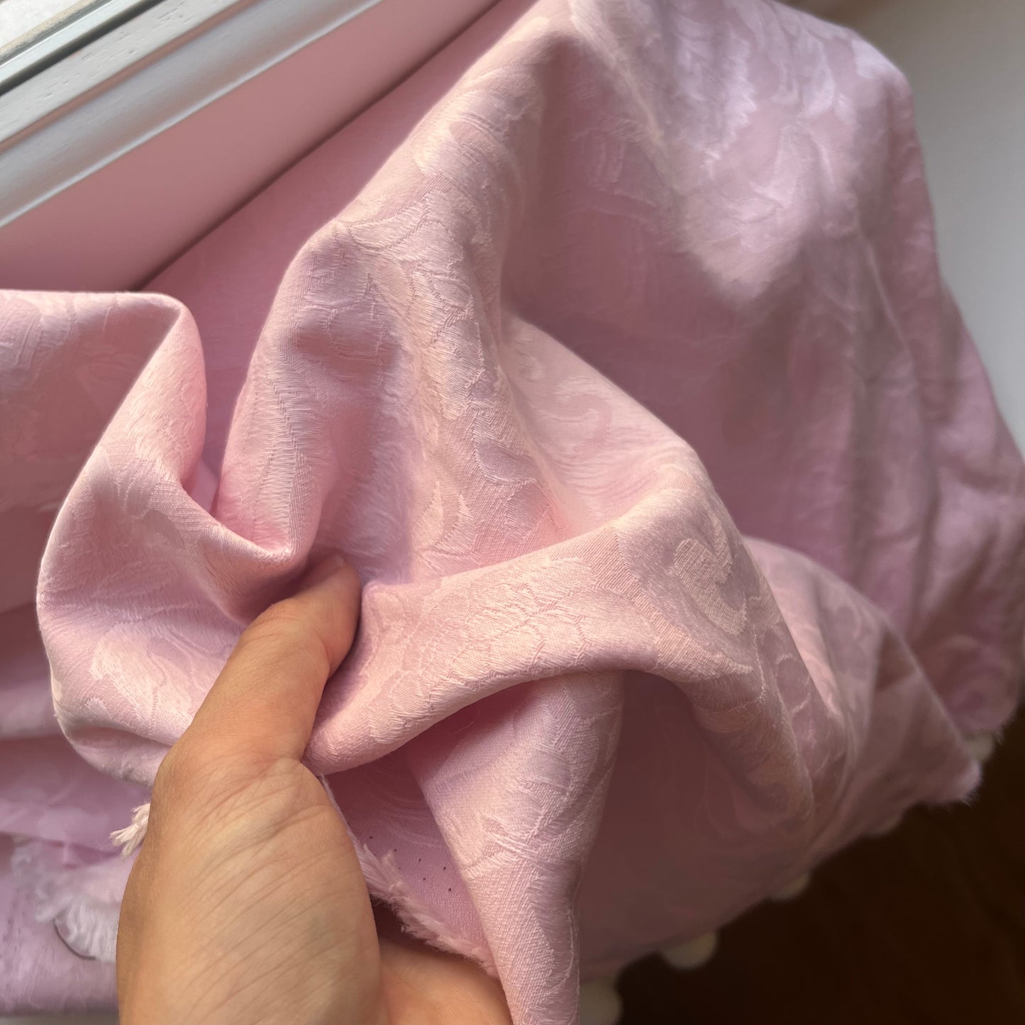Remnant of pale pink cotton jacquard