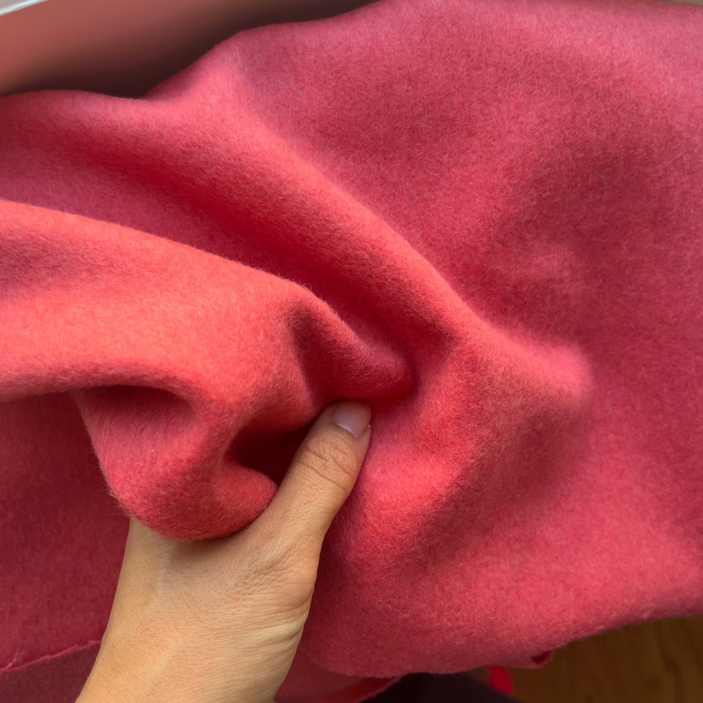 Remnant of coral pink brushed wool