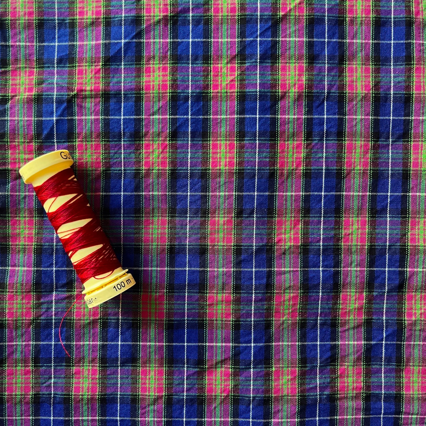 Remnant of plaid cotton in blue, pink and green.