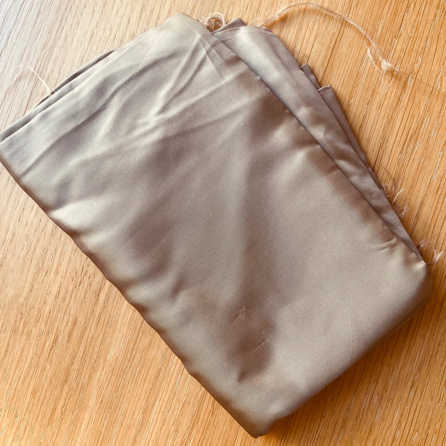 Remnant of dark gold lining fabric