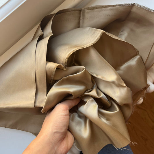 Remnant of dark gold lining fabric