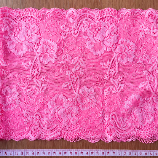 9-inch wide neon coral stretch lace